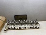 Mercedes Benz M103 Cylinder Head A1030104221 Nos New. Price: $3000.00.